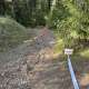 mountain trail with "danger" sign