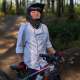 bike rider with bike, wearing helmut